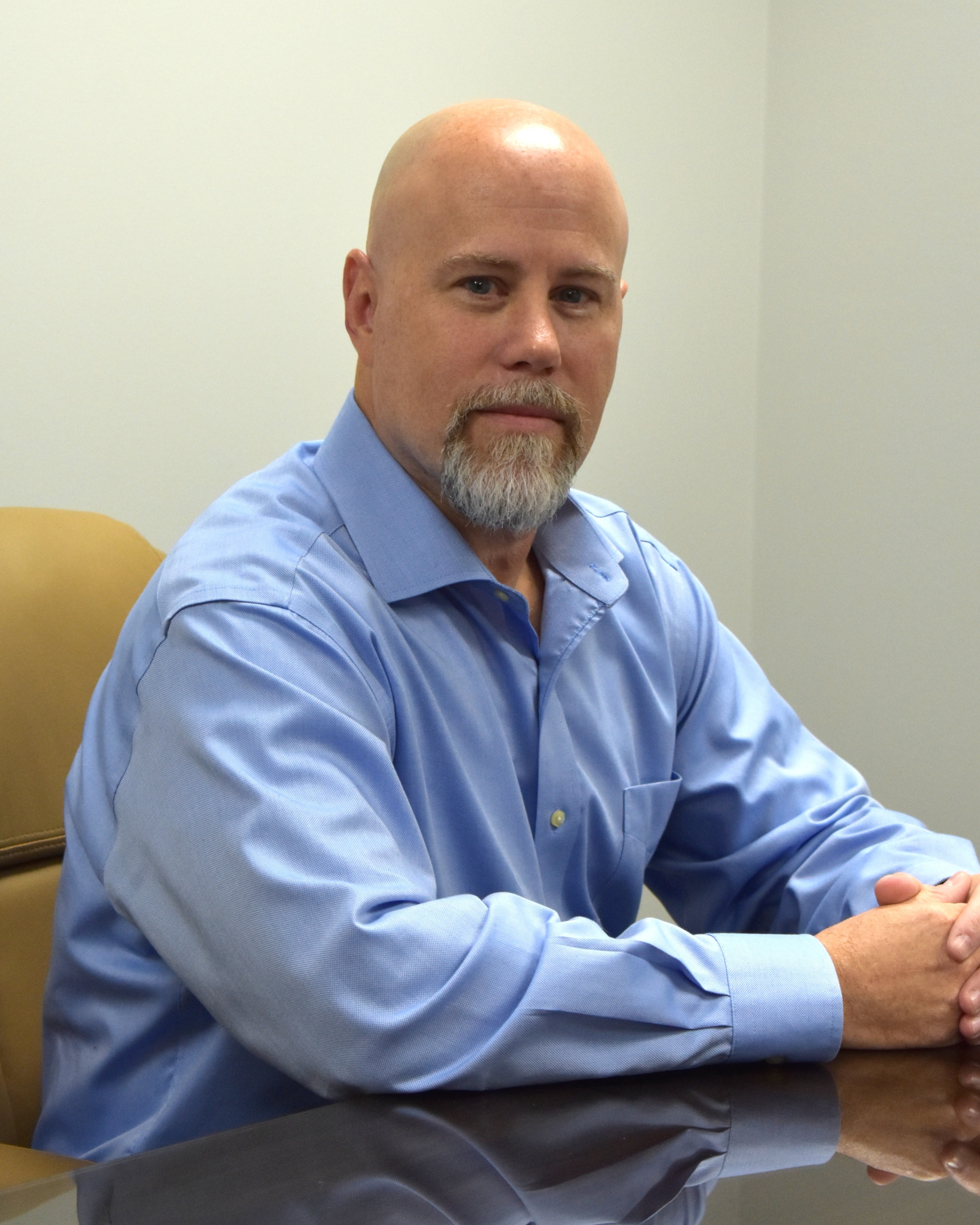 Greg North serves as IT Director at 7 Layer IT since 2017, where he leads a team that supports the company's financial services clients across the Chicagoland area. He oversees Microsoft 365 administration, endpoint security, cloud infrastructure, compliance, and more for the company's clients.